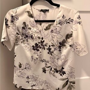 Dynamite White Floral V-Neck Short Sleeve Top with Purple and Green Accents